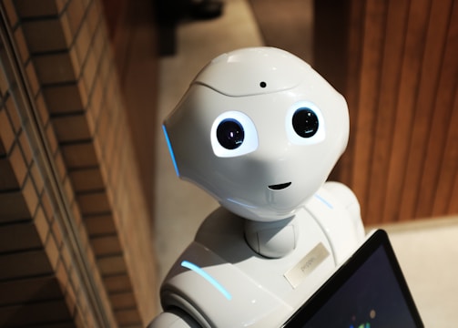 white robot near brown wall