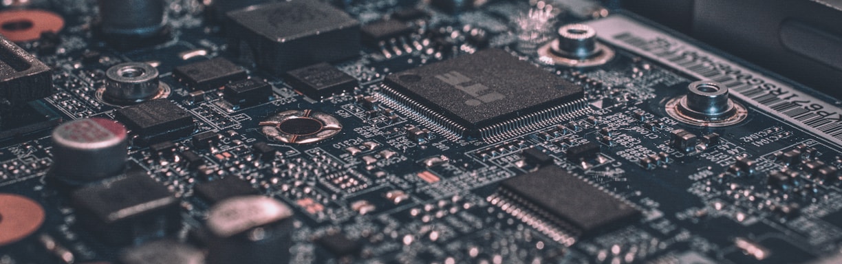 macro photography of black circuit board